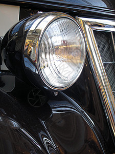 车头挡风玻璃轮缘金子古董运输反射街道保险杠金属交通背景图片