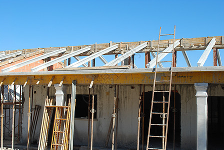 正在建造的房屋关节木板钢结构住房工业蓝色木头力量房子工作图片