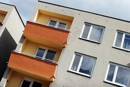 橙色和黄色前置房屋详情住宅预制件投资橙子房子建筑玻璃住房财产建筑学图片