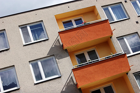 橙色和黄色前置房屋详情城市建筑学橙子玻璃投资住宅大厦建筑住房预制件图片
