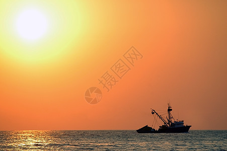 北埃斯康迪多港日落海面旅游橙子海岸季节旅行渔夫钓鱼地平线场景反射图片