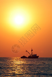 北埃斯康迪多港日落海面旅行海洋天空地平线天气场景橙子反射渔民钓鱼图片