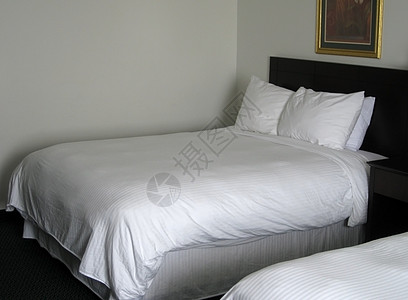 旅行旅费床单客栈白色酒店枕头旅馆房间棉被图片