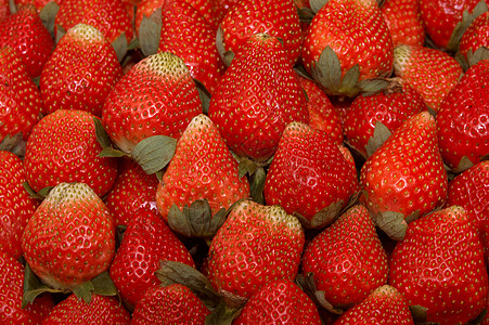 新鲜草莓水果市场背景图片