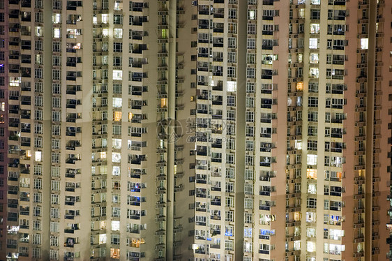 住宅楼在夜间前居住景观建筑物面板日落城市化公寓房子阳台房地产图片