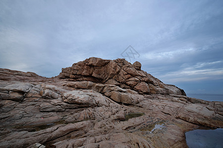 岩石海岸假期日落旅行阳光旅游蓝色天空太阳季节热带图片