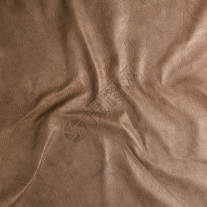 高分辨率棕色皮革材料动物颗粒状灵活性牛皮隐藏效果天气鹅卵石约性图片