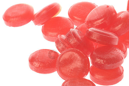 孤立的糖衣宏观粉色红色糖果大枣刺激食物图片
