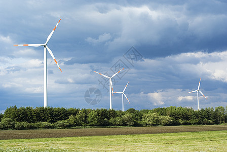 风车白色力量涡轮机活力旋转绿色发电机场地蓝色环境图片