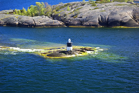 瑞典群岛天空支撑海岸线海岸蓝色爬坡岩石海洋悬崖海浪图片