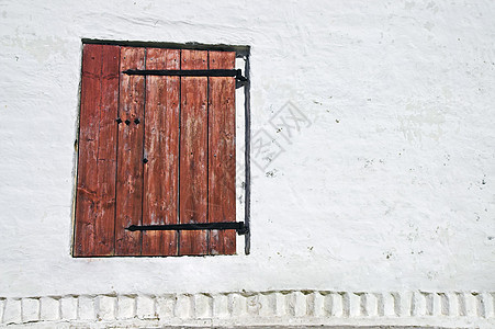 窗口特写器建筑物入口正方形胡同腐蚀锁定太阳墙壁房子崎岖图片