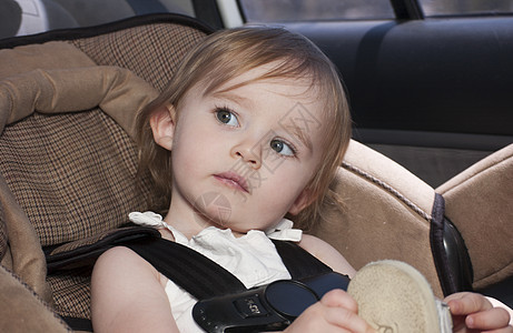 座椅孩子婴儿内饰座位摄影连裤袜法律后座女孩微笑图片