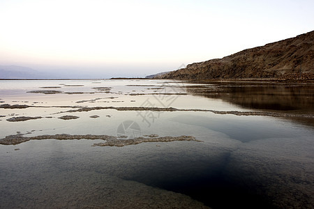 日落时死海药品矿物沙漠地球地形全景圣经温泉化妆品地面图片