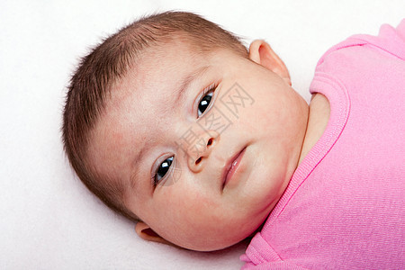 可爱的婴儿脸孔新生粉色白色图片