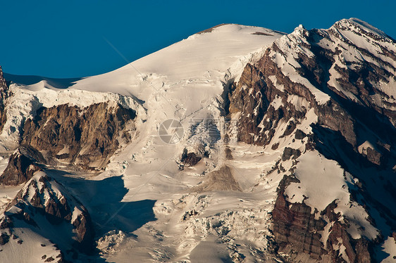 Mt 兰尼埃冰川阴影火山顶峰岩石天空图片