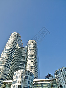 现代摩天大楼市中心建筑物职场商业建筑金子公司窗户多层房地产背景图片