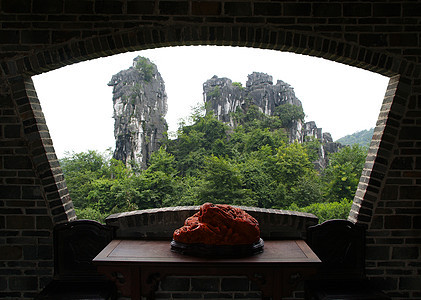 中国的桂林风景树木家园旅行框架日落顶峰劳动石头爬坡窗户图片