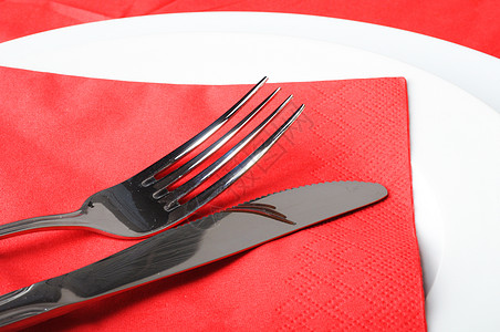 不锈叉和刀餐巾午餐餐具盘子菜肴餐厅厨房食物红色银器图片