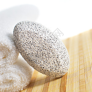 Spa 显示竹子皮肤优雅毛巾白色奢华石头浮石保健宏观图片