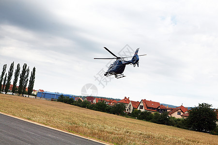 警务直升机货物航班旅行解脱飞机翅膀蓝色警察机场法律图片