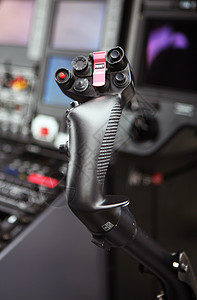 直升机驾驶舱黑色座位机场飞机座舱航天控制菜刀技术乐器图片