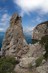 山与海岩石晴天旅行热带假期海岸线阳光海浪海洋风景图片