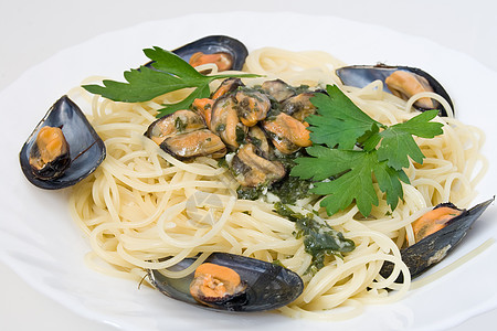 带贝贝壳的意大利面条海鲜蔬菜饮食化合物盘子碳水食物美食香菜图片