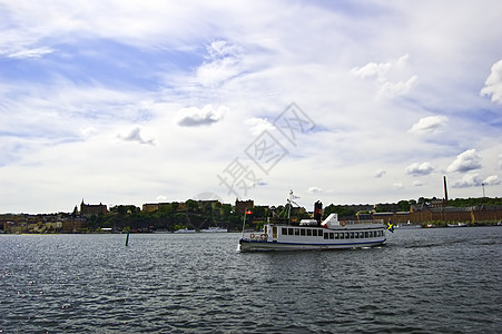 在斯德哥尔摩的旧日船舶蓝色建筑港口海岸支撑房屋高地中心场景城市图片