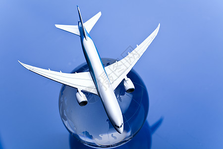 蓝色背景的地球航空班机全球行星航空公司航班飞机场技术乘客世界插图客机图片