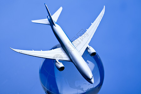 蓝色背景的地球航空班机行星乘客航班旅行插图国际全球技术天空护照背景图片