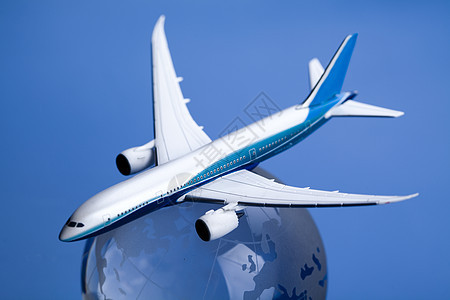蓝色背景的地球航空班机乘客航空公司技术飞机场插图商业飞机旅行护照圆圈背景图片