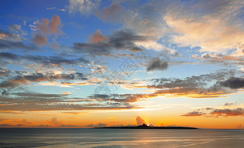 日落橙子地平线天空晴天墙纸石头天气金子海岸海浪图片