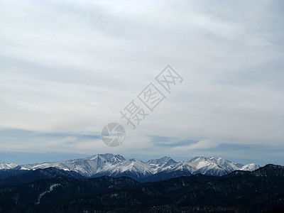 高山山脉雪峰木头岩石冰川全景天空距离风景白色文件图片