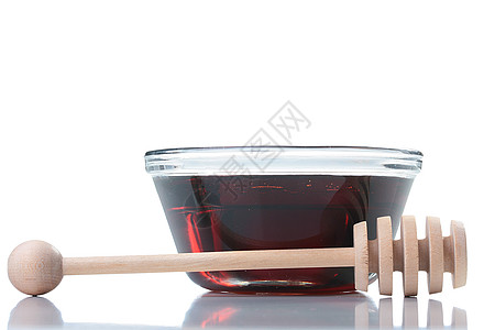 亲爱的优势棕色健康商品治疗服务勺子木头食物玻璃背景图片