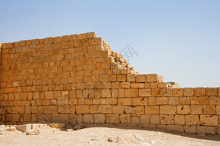 古寺庙废墟的破碎墙壁黄色砂岩堡垒建筑走廊天空石头风化古董建筑学图片