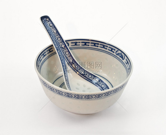 配勺子的亚洲陶瓷小盘图片