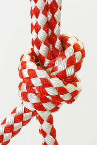 带结的绳子节点力量环形难点紧张绳索黄麻白色纤维宏观图片