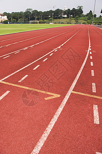 正在运行轨道挑战车道竞赛体育场锻炼运动运动员竞争曲线场地背景图片