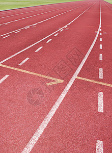正在运行轨道场地曲线车道体育场运动员竞争挑战运动锻炼竞赛图片