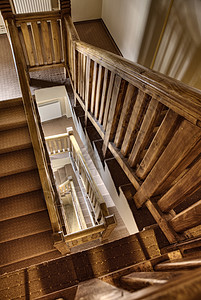 楼梯木头螺旋酒店棕色脚步散热器地毯中心背景图片