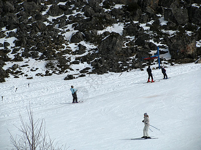 滑雪者休闲风景血统运动滑雪板岩石白色解脱速度旅游图片