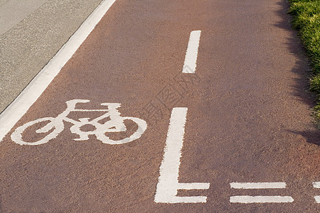 自行车车道速度运输车辆白色交通小路运动街道绿色叶子图片