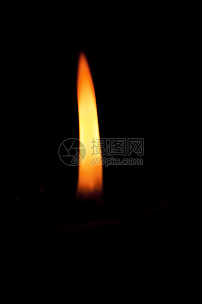 蜡烛火焰黄色黑色照明红色橙子图片