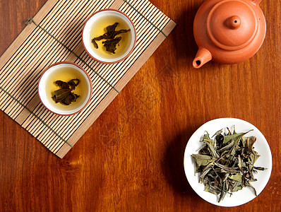 中国茶竹子食物叶子仪式飞碟茶壶卫生陶器液体金子图片