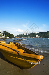 海滩上的船海洋支撑海浪旅游木头情调热带海岸线独木舟皮艇图片