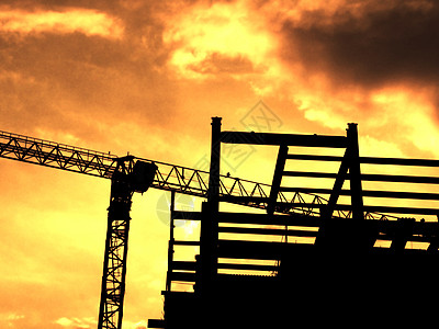 建筑施工起重机结构工地建筑工人背景图片