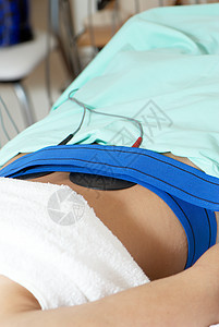 腹腔按摩 在按摩院患者真空皮肤治疗按摩师温泉纤维素电线沙龙绷带图片