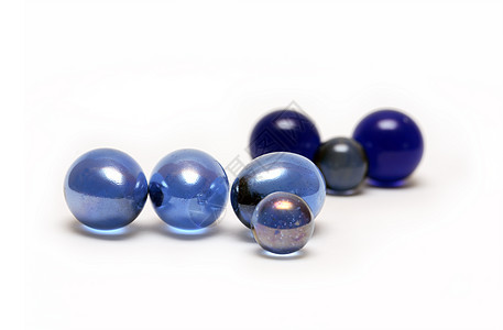 蓝玻璃球水晶弹珠蓝色水晶球闪电白色背景图片