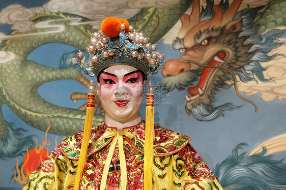 州歌剧木偶演员展示传统男人蓝色旅游服饰翅膀化妆品国王图片