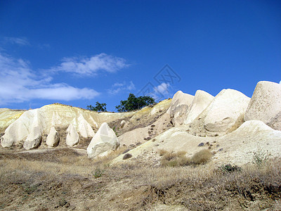 山区谷地太阳赭石爬坡天空山脉图片